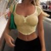 Sa94dc00681cf4f4d9737d4f8568eeb76M.jpg Women’s See-Through Button Crop Top